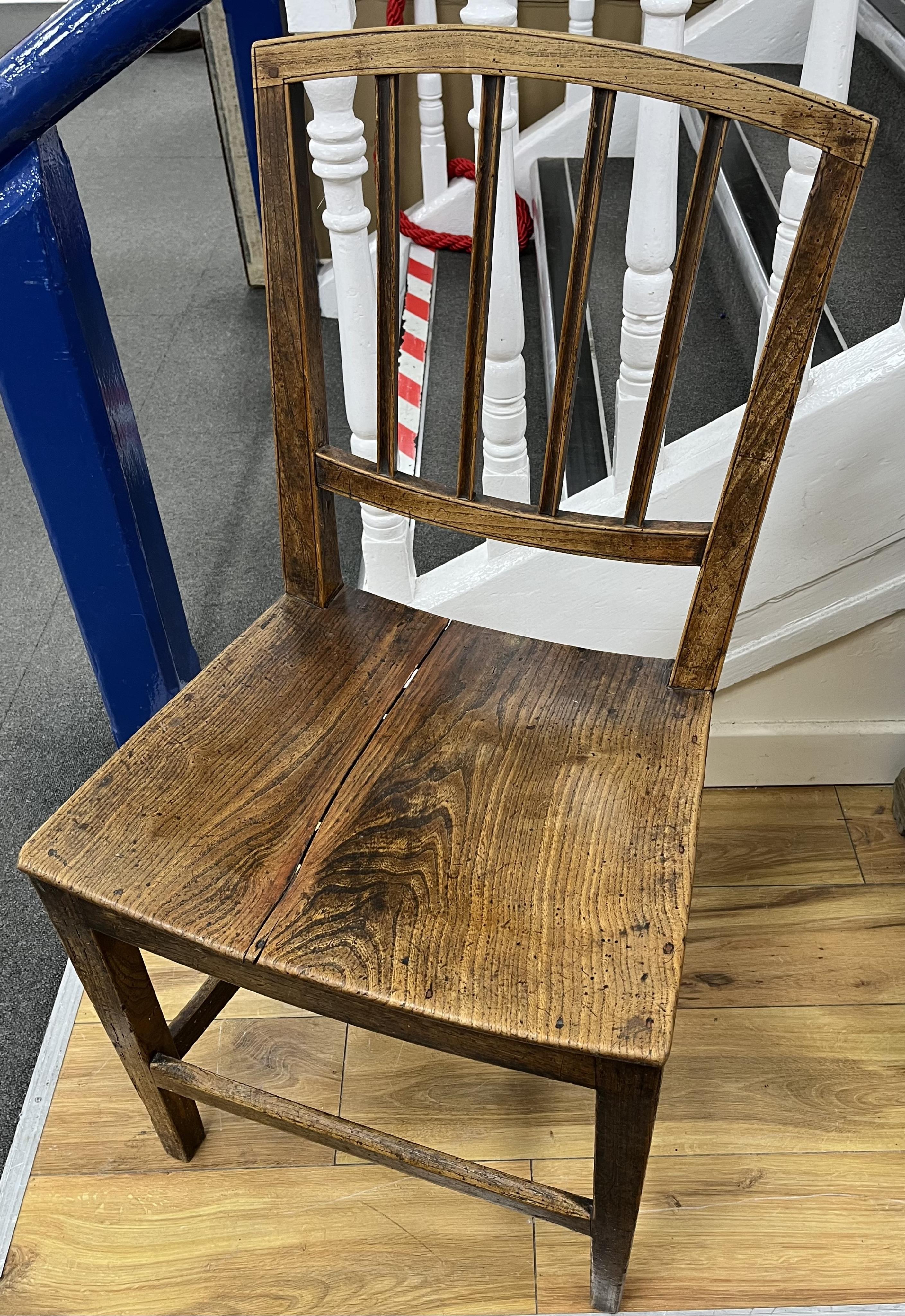 A set of six George III Provincial elm wood seat dining chairs. Condition - fair
